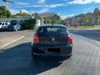 Gebraucht BMW 116 122 PS (89 kW) 2009 Schwarz Kleinwagen