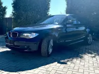 Second-hand BMW 116 122 CP (89 kW) 2007 Albastru Hatchback