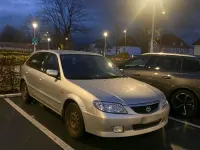 Usata Mazda 323 98 CV (72 kW) 2002 Argento Utilitaria