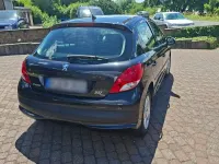 Gebraucht Peugeot 207 95 PS (69 kW) 2010 Schwarz Kleinwagen