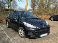 Gebraucht Peugeot 207 73 PS (53 kW) 2010 Schwarz Kleinwagen