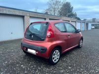 Gebraucht Peugeot 107 68 PS (50 kW) 2010 Orange Kleinwagen