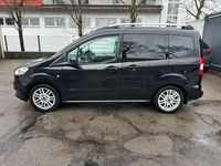 Gebraucht Ford Tourneo Courier Titanium 101 PS (74 kW) 2016 Iridiumschwarz metallic Van / Kleinbus