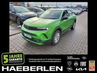 Gebraucht Opel Mokka-e Edition 100 kW (136 PS) 2022 Matcha green/ikone gruen (metallic) SUV