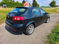 Gebraucht Chevrolet Lacetti CDX 121 PS (88 kW) 2010 Karbonschw graphitschw midnigh Kleinwagen