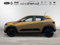 Gebraucht Dacia Spring Extreme 47 kW (65 PS) 2025 Safaribeige Kleinwagen