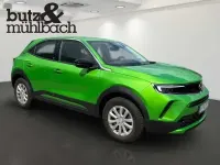 Gebraucht Opel Mokka-e 100 kW (136 PS) 2021 Matcha green (metallic) SUV