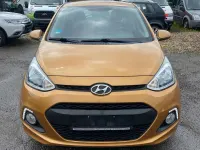 Gebraucht Hyundai i10 Trend 67 PS (49 kW) 2015 Mandarin orange / mic Kleinwagen