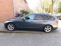 Gebraucht BMW 318 145 PS (106 kW) 2014 Silber Kombi