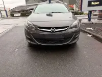 Używany Opel Astra Edition 110 KM (80 kW) 2012 Szary Sedan/Limuzyna