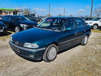 Używany Opel Astra 75 KM (55 kW) 1997 Zielony Sedan/Limuzyna