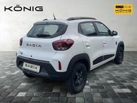 Gebraucht Dacia Spring Extreme 47 kW (65 PS) 2023 Kaolinweiß Kleinwagen