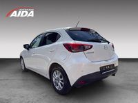 Używany Mazda 2 Exclusive 90 KM (66 kW) 2015 Biały Sedan/Limuzyna