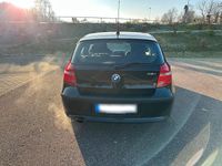 Gebraucht BMW 116 122 PS (89 kW) 2009 Schwarz Kleinwagen