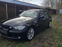 Gebraucht BMW 318 129 PS (94 kW) 2006 Schwarz Kombi