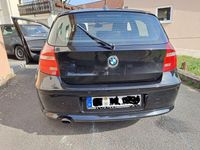 Gebraucht BMW 116 122 PS (89 kW) 2009 Schwarz Kleinwagen