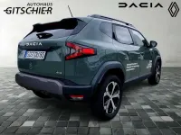 Gebraucht Dacia Duster Journey 131 PS (96 kW) 2025 Safarigrüngrau Limousine