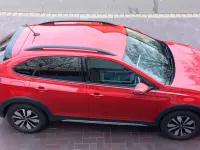 Używany VW Taigo Move 110 KM (80 kW) 2024 Czerwony SUV