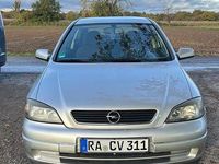 Second-hand Opel Astra 103 CP (75 kW) 2004 Argintiu Coupe