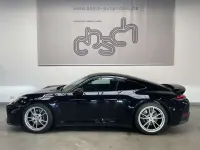 Gebraucht Porsche 911 Carrera 394 PS (289 kW) 2025 Tiefschwarz Coupé