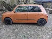 Gebraucht Daihatsu Trevis 58 PS (42 kW) 2006 Orange Kleinwagen