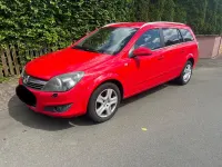 Gebraucht Opel Astra 105 PS (77 kW) 2009 Rot Kombi