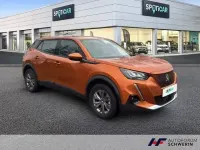 Gebraucht Peugeot e-2008 Active 100 kW (136 PS) 2021 Orange metallic (metallic) SUV