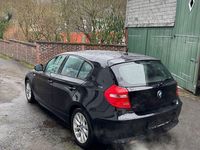 Gebraucht BMW 116 122 PS (89 kW) 2010 Schwarz Kleinwagen