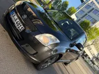 Usado Suzuki Swift 93 CV (68 kW) 2010 Negro Utilitario