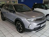 Gebraucht Opel Mokka-e Ultimate 100 kW (136 PS) 2021 Kontrast grau/quarz silber SUV