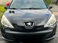 Używany Peugeot 206 75 KM (55 kW) 2009 Czarny Sedan/Limuzyna