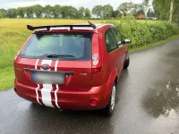 Gebraucht Ford Fiesta 75 PS (55 kW) 2007 Rot Kleinwagen