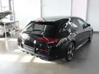 Gebraucht Mercedes CLA250 AMG Line Premium Plus 163 PS (119 kW) 2023 Metalliclack kosmosschwarz Coupé