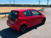 Gebraucht Toyota Aygo 68 PS (50 kW) 2005 Rot Kleinwagen