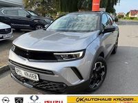 Gebraucht Opel Mokka Ultimate 131 PS (96 kW) 2023 Kontrast grau/quarz silber (metallic) SUV