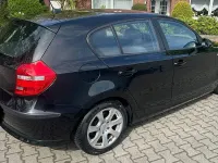 Second-hand BMW 116 122 CP (89 kW) 2009 Negru Hatchback