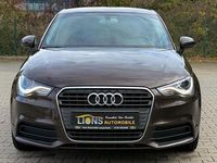 Gebraucht Audi A1 Sportback Attraction 105 PS (77 kW) 2012 Braun Kleinwagen