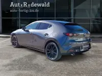Neu Mazda 3 Nagisa 140 PS (102 kW) 2026 Machine grey metallic Limousine