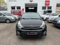 Używany Kia Rio Attract 75 KM (55 kW) 2015 Czarny Sedan/Limuzyna