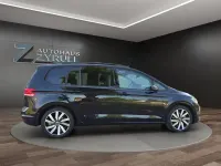 Gebraucht VW Touran Highline 150 PS (110 kW) 2025 Schwarz Van / Kleinbus