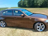 Gebraucht BMW 116 116 PS (85 kW) 2010 Braun Kleinwagen