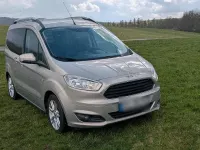 Gebraucht Ford Tourneo Courier 101 PS (74 kW) 2018 Silber Van / Kleinbus
