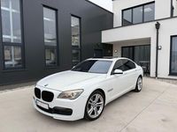 Second-hand BMW 740 Shadowline 306 CP (225 kW) 2011 Alb Berlinǎ