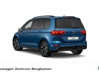 Gebraucht VW Touran Style 150 PS (110 kW) 2023 Caribbean blue metallic Van / Kleinbus