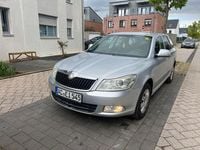 Second-hand Skoda Octavia Ambiente 105 CP (77 kW) 2010 Argintiu Break