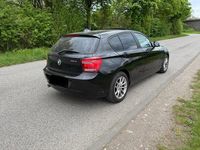 Second-hand BMW 118 143 CP (105 kW) 2013 Negru Hatchback