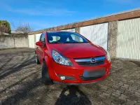 Używany Opel Corsa 60 KM (44 kW) 2009 Czerwony Hatchback