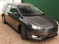 gebraucht Ford Focus Turnier 1.0 EcoB. Titanium/ PDC/ Navi/ SHZ