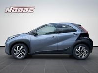 Gebraucht Toyota Aygo X Team 72 PS (52 kW) 2024 Celestite grey metallic/ dach mysticschwarz mica SUV