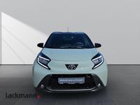 Gebraucht Toyota Aygo Pulse 72 PS (52 kW) 2024 6x3)/ black mica (209) (gruen Kleinwagen